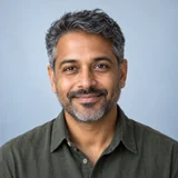 AI-generated portrait of a fictional travel photographer